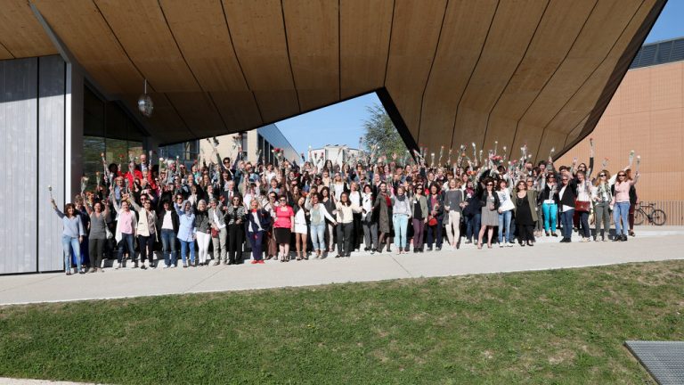 Group of employees at EPFL near ArtLAB