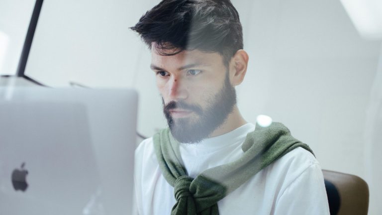 man in front of computer