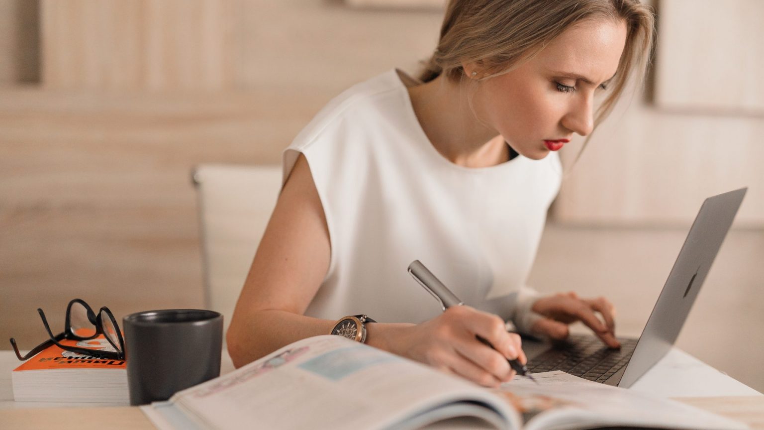 women studying at her computer