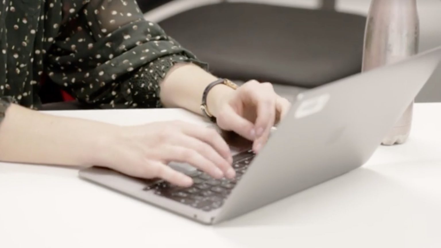 Person typing on a computer