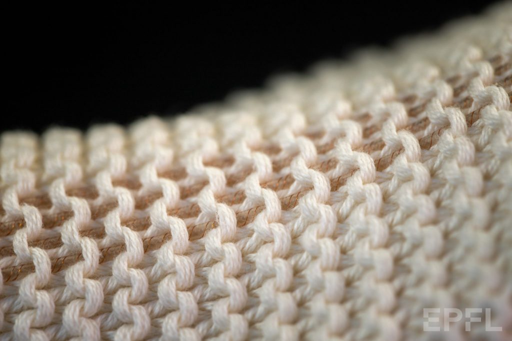 Fiber pumps sewn into a woven textile